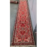 A Malayer runner rug, 400x83cm