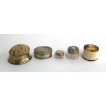 An 800 silver pill box; a silver hallmarked pin cushion; two silver topped glass pots; and a bone