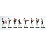 A vintage lead toy soldier marching band, comprising eight pieces