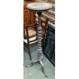 A turned wood pot stand, dish top on barleytwist column and carved cabriole tripod base, 122cmH