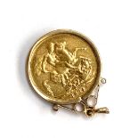 A Victorian gold sovereign, 1874, in 9ct gold mount, 9.2g
