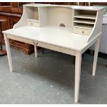 A contemporary grey painted desk, having a superstructure of drawers and shelves, over a single