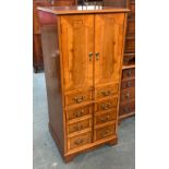 A walnut veneer hi-fi cabinet, with slate shelf, 55x51x124cm