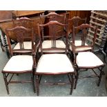 A set of six Edwardian dining chairs, two carvers