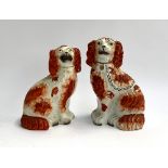 A near pair of Staffordshire dogs, 25cmH and 23cmH