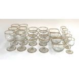 A quantity of stemmed glasses and bowls, 20 pieces, rims heightened in gilt