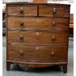 A 19th century mahogany bowfront chest, two short over three long drawers, on bracket feet,