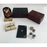 A mixed lot to include silver mounted wallet; cast iron 'door mouse' doorstop; two lacquered boxes
