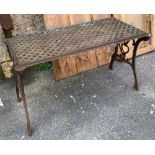 A cast iron garden table with latticed top, 118x62x65cmH