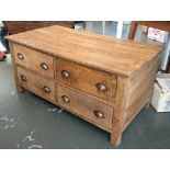 A light oak coffee table, with four bi-directional drawers, 110x60x51cmH