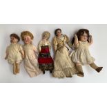 An Armand Marseille doll; together with one other German bisque doll; a French doll and two others