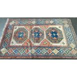 A Persian wool rug, 230x140cm
