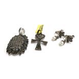 A 925 silver ankh and Celtic knot pendant set with marcasites, approx. 4.5g; together with a pair of