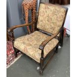 An early 20th century upholstered oak armchair, 82cmW