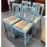 A set of four blue painted dining chairs, with drop in upholstered seats