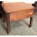 An early 19th century oak stool/occasional table, hinged top on moulded square section legs,