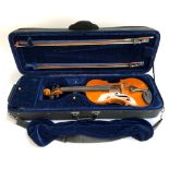 A full size violin in hard rectangular case, marked 'Manufactured in Dresden', with two bows and