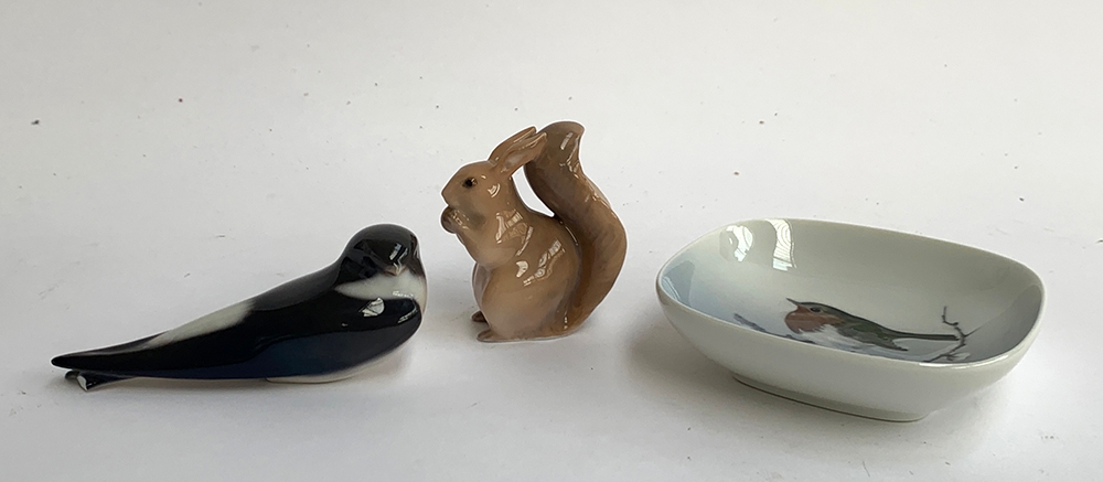 Three pieces of Royal Copenhagen porcelain, to include robin design pin dish, squirrel and