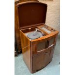 A mid century radiogram, with turntable and tuner, storage below, 63x47x92cmH