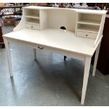 A contemporary grey painted desk, having a superstructure of drawers and shelves, over a single