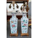 A pair of Chinese square tapered ceramic table lamps with double fittings, each 49cmH