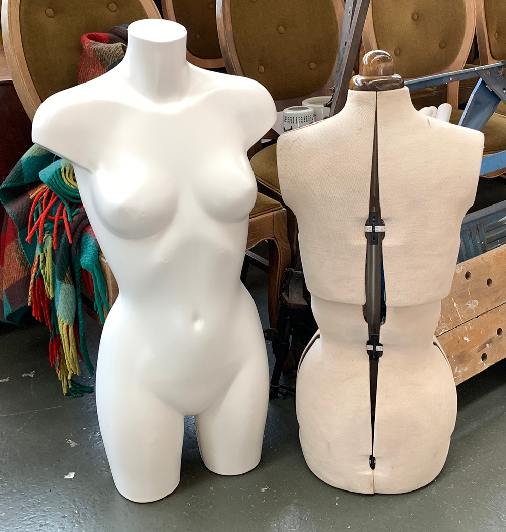 A dressmakers mannequin together with one other