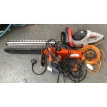 A Castor hi-tech E1.6 electric chainsaw; together with a Spear & Jackson electric hedge trimmer