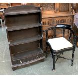 A bowfronted waterfall bookcase, four shelves with drawer below, 60cmW; together with an ebonised