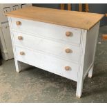 A small white painted chest of three drawers, the top light oak, 91x44x75cmH