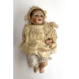 A Hertel & Schwab bisque baby doll, marked 152 2/0, approx. 26cmL