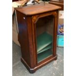 A small 19th century mahogany and marquetry glazed cupboard, baize lined shelves, flanked by