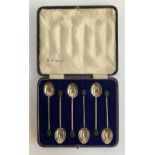 A cased set of six silver coffee bean terminal coffee spoons by Walker & Hall, 1929