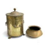 A brass lidded coal bucket, of cylindrical forms, twin handles and applied swags, on pad feet,