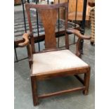 A good provincial George III oak splatback open armchair, with drop in seat, on square section