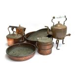 A mixed lot of copper items, to include two copper kettles, one trivet, copper jug, lidded pop
