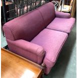 A large purple three seater sofa, 210cmW