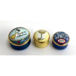 A collection of three Halcyon Days millennium themed trinket boxes