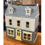 A modern dolls house, four rooms plus attic, 67x37x77cmH (to top of chimney pots)