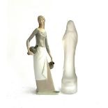 An NAO figure of a girl with jugs; together with a Lalique style figure of a robed woman, each
