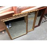 Two moulded gilt framed wall mirrors, each with bevelled glass, 83x60cm and 82x56cm; together with