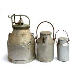 A vintage aluminium milk pail with lid and apparatus, approx. 49cmH; together with two others