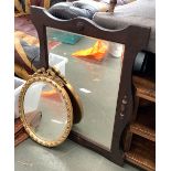 An oak framed wall mirror with bevelled glass, 75x55cm; together with a small gilt framed mirror