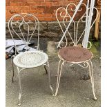 Two wrought metal garden chairs