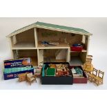 A brick effect dolls house, 70cmW, containing a quantity of furniture and accessories