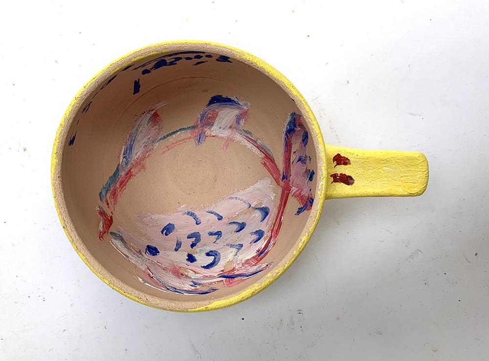 Simeon Stafford, a hand painted ceramic bowl depicting a face, fish painted inside with artist's - Image 3 of 4