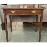 An early 19th century oak side table, moulded top over single frieze drawer, on square tapered legs,