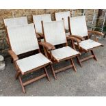 A set of six teak framed folding garden chairs
