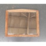An oak framed wall hanging mirror with bevelled glass plate, 49x58cm