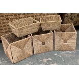 A set of three square rush storage baskets, 31x31x31; together with two other rush storage trays