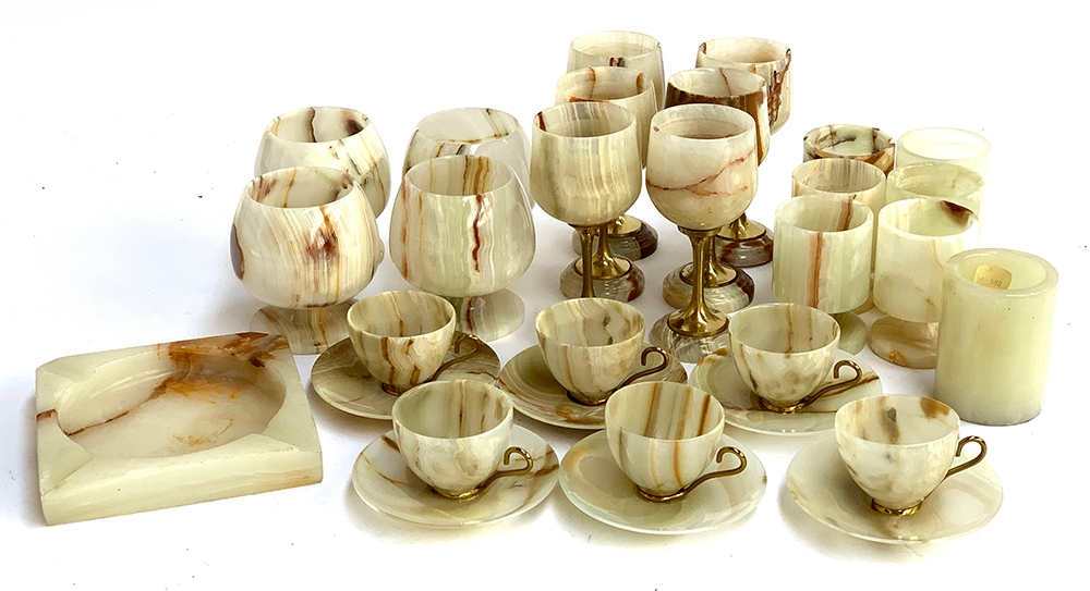 A quantity of onyx to include, six goblets, six coffee cups and saucers, four brandy balloons, six
